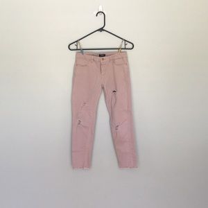 Pink ripped jeans